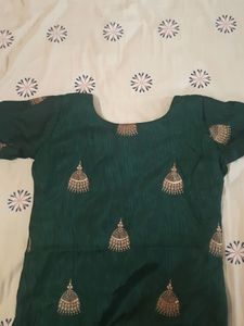 Dark Green Kurta With Golden Jumka Design
