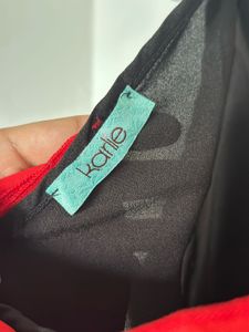 Chic Black Top w/ Red Bow