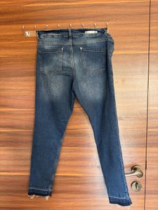 Distressed Denim Jeans