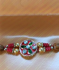 Stone Petaled Rakhi For Raksha Bandhan
