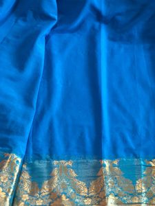 Elegant Blue Saree with Gold Border