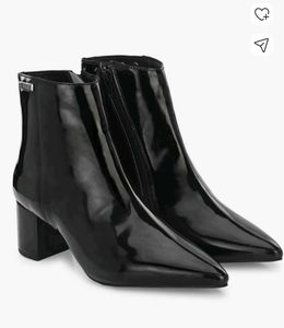 women black heeled Chelsea boots