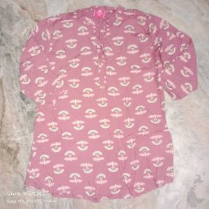 A Peach Colored Top For Casual Nd Official Wear
