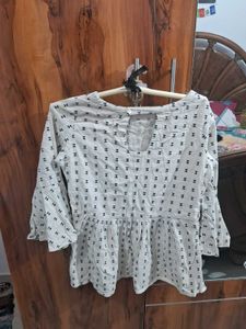 Patterned Peplum Top