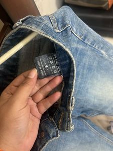 Ripped Knee Denim Jeans