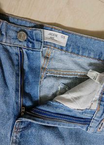 Ripped Blue Denim Jeans