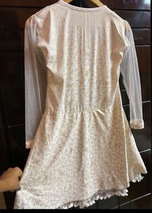 White dress with golden work