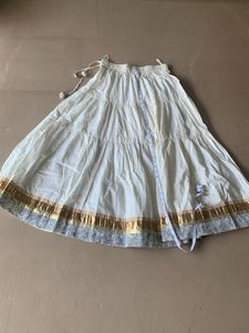 Fix price cream and golden skirt