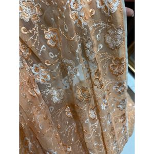 Elegant Peach Floral Saree