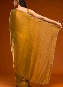 Trendy golden Saree with designer blouse