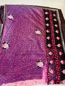 A Beautiful Pink Black Combination Floral Saree