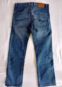 Distressed Blue Wash Denim Jeans