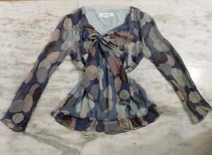 Stylish Top with Tie Detail.