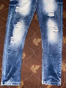 Distressed Denim Jeans