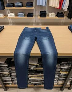 Distressed Denim Jeans