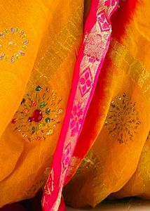 one time used saree with yellow and pink colour