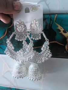 three long Elegant Silver Jhumka Earrings