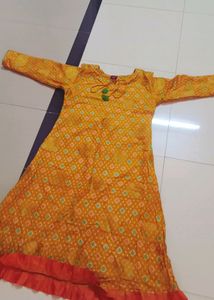 Orange / Ochkar Yellow Kurti And Leggings.