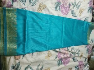 Teal Blue Saree with Gold Border