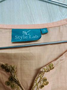 Elegant Peach Kurti with Intricate Golden Embellis