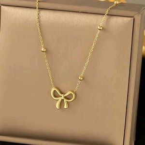 Gold Bow Necklace