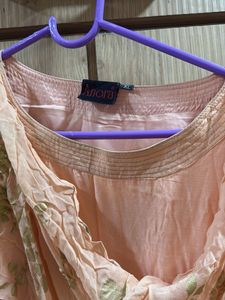 peach gown with cowl and attached drape