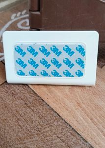 Portronics Wall Mobile Holder.