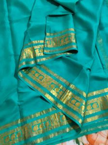 Elegant Teal & Gold Saree