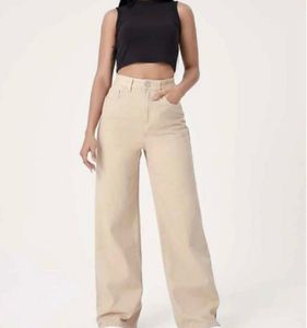 Jeans , Tan Tops And Carpet