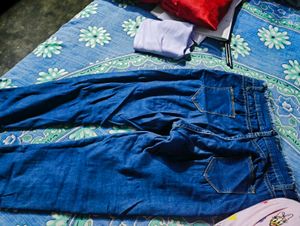 Ripped Blue Denim Jeans