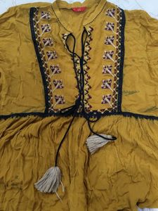 Embroidered Mustard Peplum Top
