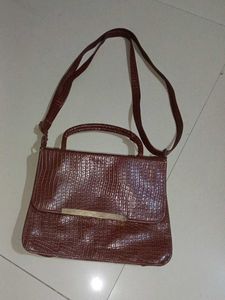 brown handbag crocodile pattern