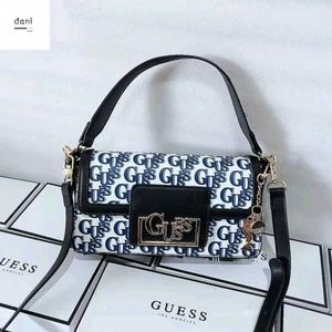 GUESS PREMIUM QUALITY SLING BAG WD BOX