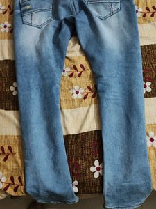 Distressed Denim Jeans