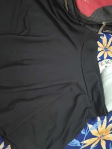 a black skirt with attached shorts inside