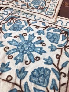 Wool embroidered cushion cover