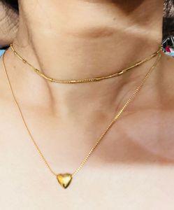 golden and silver pendent combo