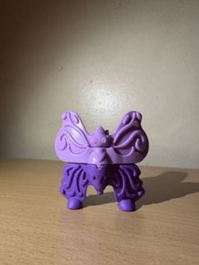 Purple Toy Figurine