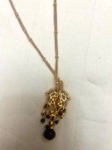 Elegant Gold and Black Necklace