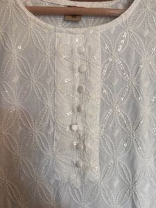 Elegant White Embroidered Kurti