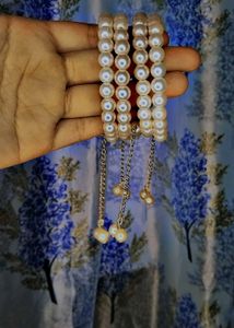 Pearl Bangles with Dangling Charms