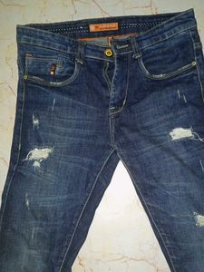 Distressed Blue Jeans