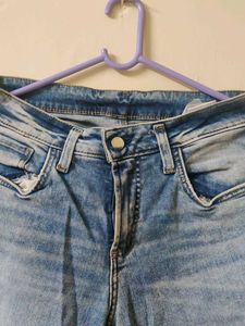 Ripped Blue Denim Jeans