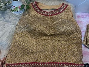 Backless golden choli