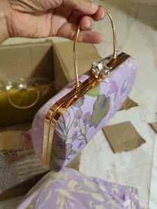 Purple Printed Hand Clutch With Sling