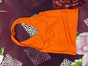 A Orange Back Less Top