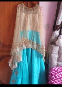 Its a Very  Beautiful  Gown With Ponchu