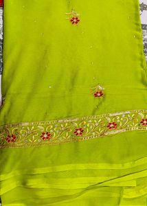Green Embroidered Saree with red contrast blouse