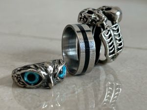 Pack Of 4 Assorted Silver Rings With Free Necklace