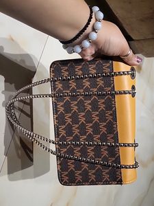 MK SLING Bag